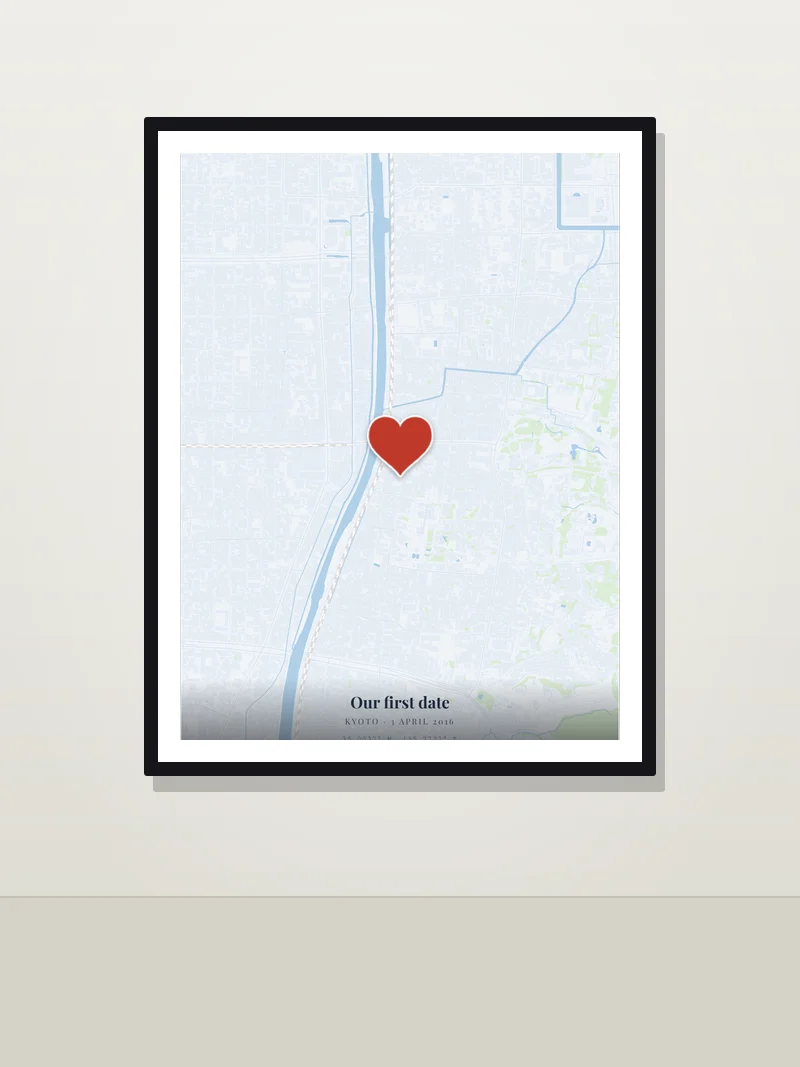 Kyoto — "Our first date" — framed anniversary map poster on a wall