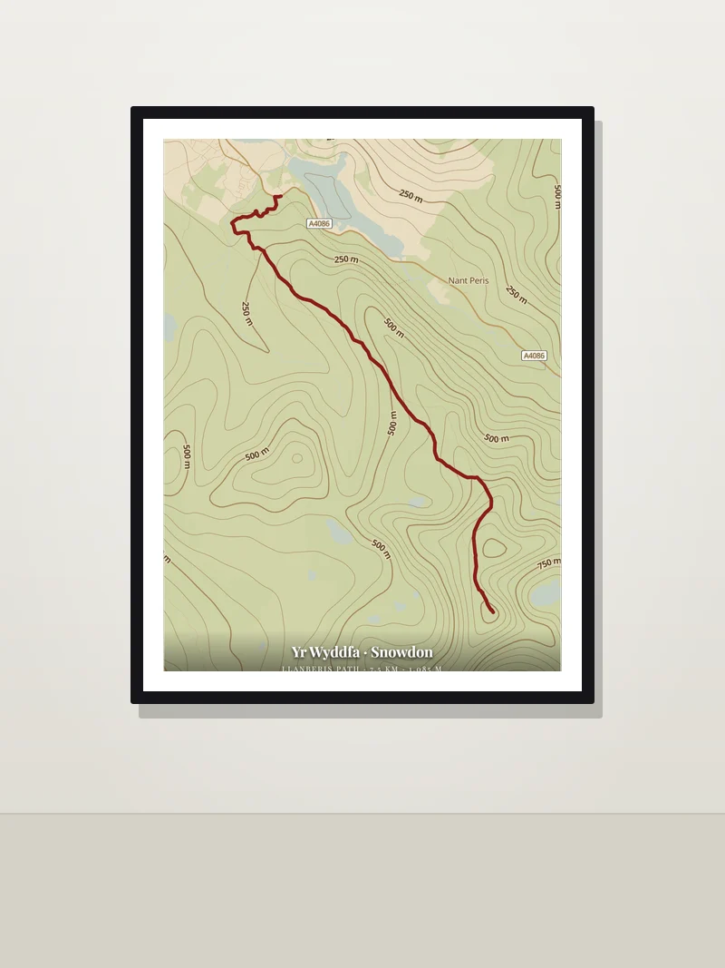 Yr Wyddfa · Snowdon, Wales — framed hiking trail map poster on a wall