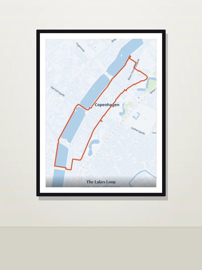 The Lakes Loop, Copenhagen — framed running route poster on a wall