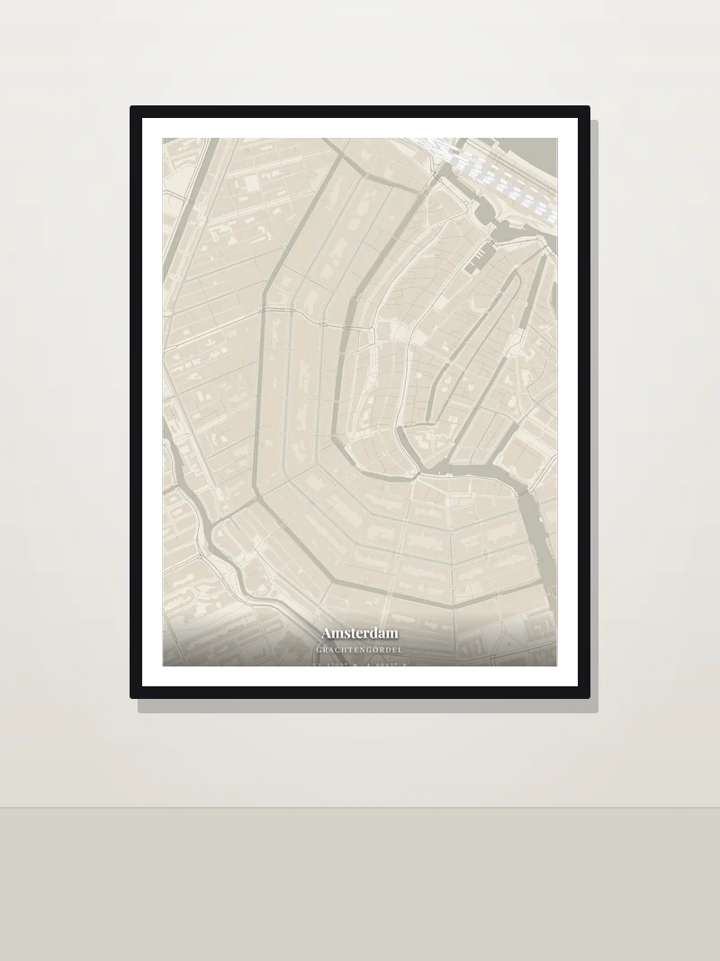 Amsterdam canal ring — framed street map poster on a wall